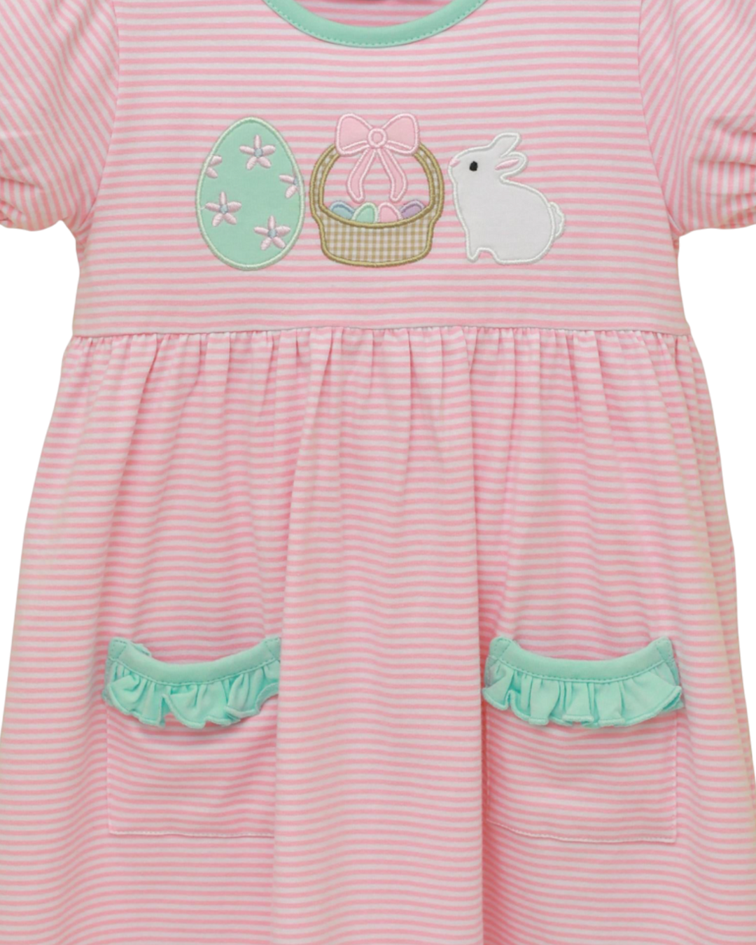 Pink striped dress with Easter-themed appliqués on a white background